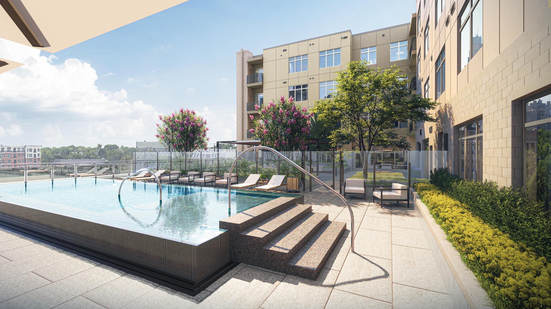 A rendering of a shimmering pool and lounge chairs in the active courtyard at Coulter Place