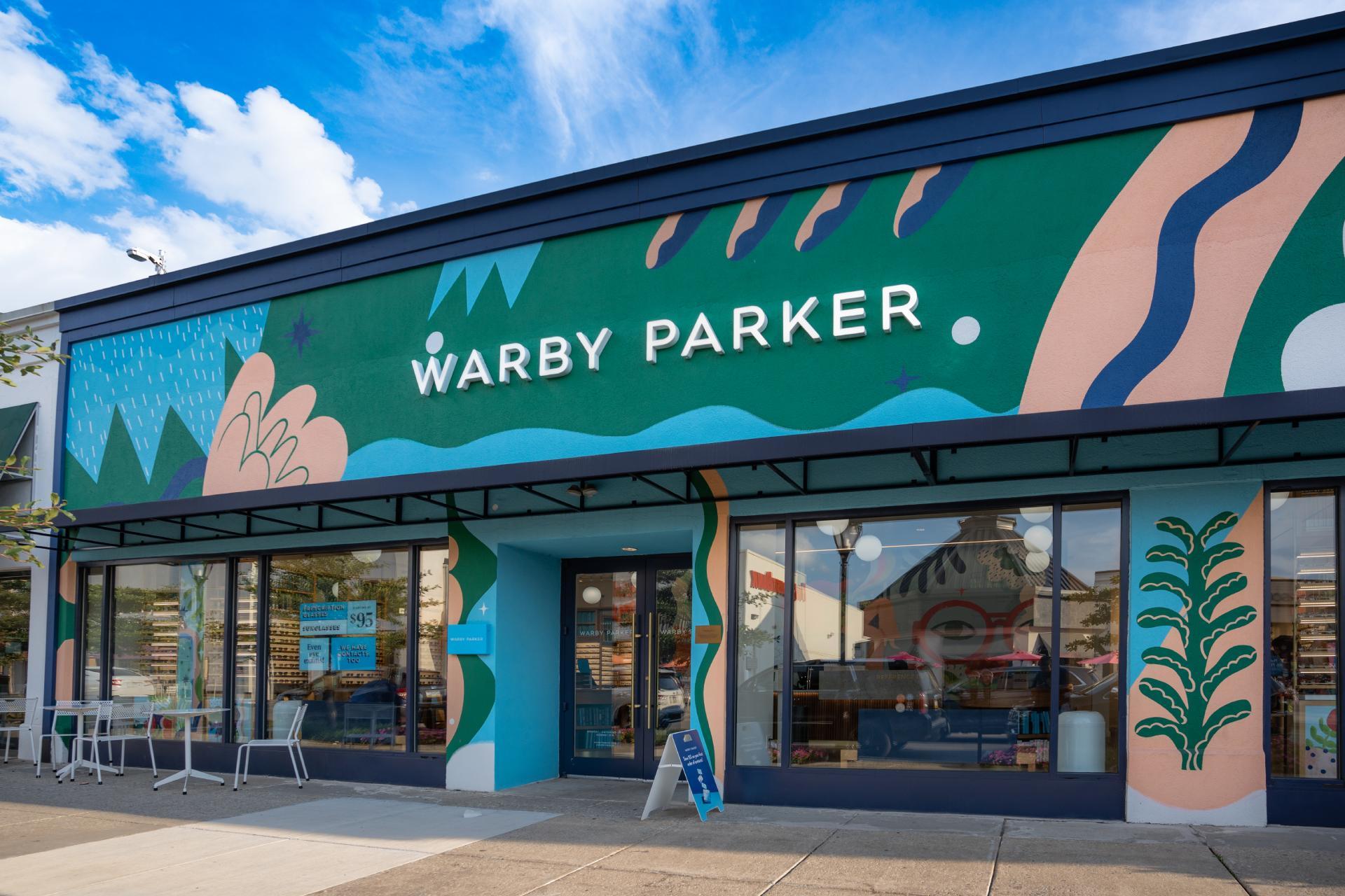 The fashionable Warby Parker eyewear store in Suburban Square with a color mural on the façade